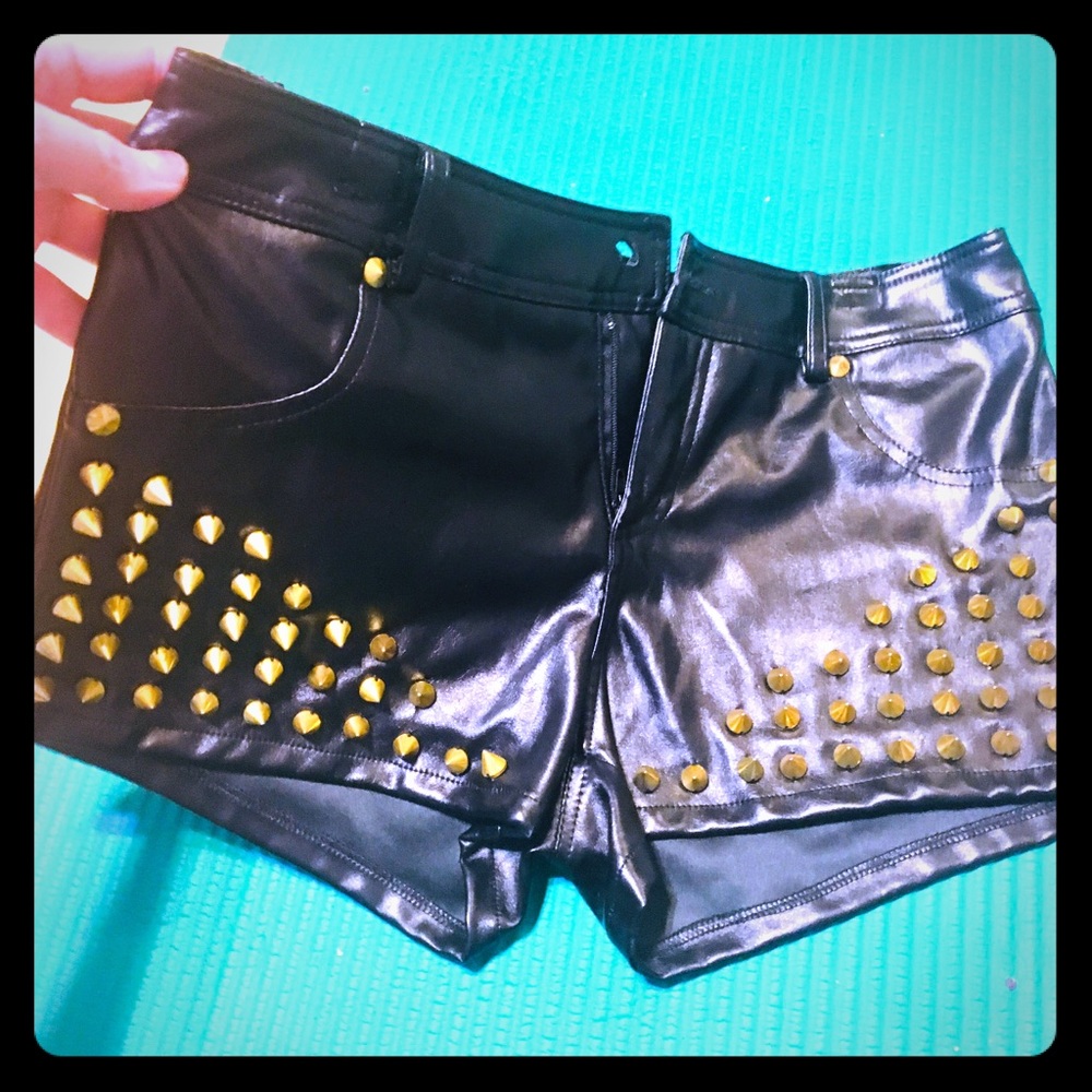 Studded black pleather shorts